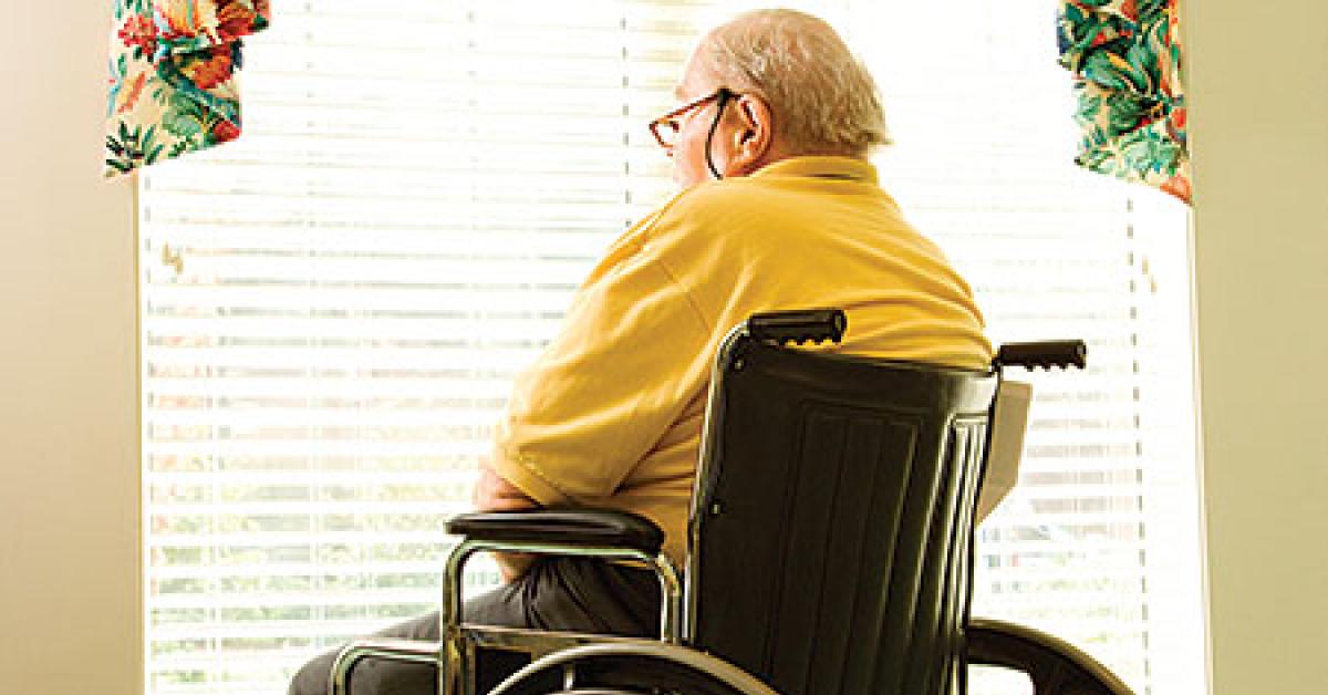 02b42844 old man in wheelchair