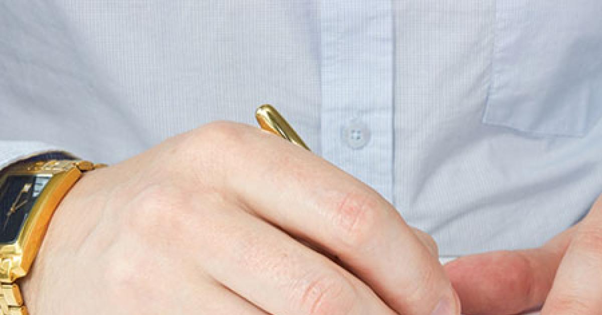 4329 02247 hand signing contract web