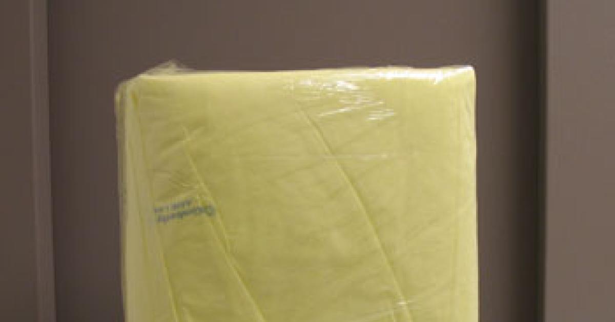 Package of disposable barrier isolation gowns.