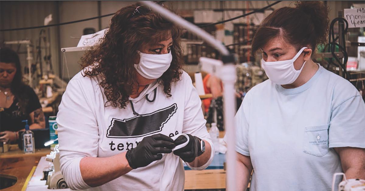 Employees at SanMar making facemasks